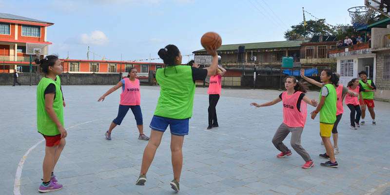 Playing Basketball match between students from France and Lower TCV